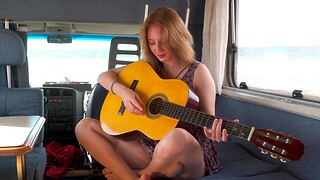 Cute Emma Korti plays a guitar before masturbating in the RV
